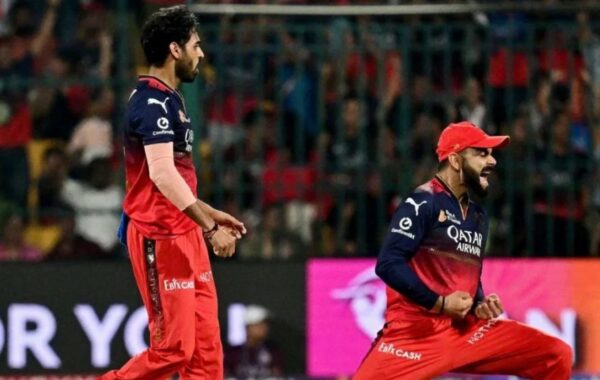1778698532536 Bhuvneshwar Kumar and Virat Kohli